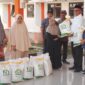 Pemda Touna Menyalurkan Bantuan Beras Cadangan Pangan Pemerintah Periode Bulan Juni-Juli 2025.