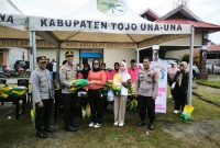 Kapolres Touna AKBP Yanna Djayawidya,SIK,.MH Didampingi Wakapolres Kompol Mulyadi Meninjau Langsung Pelaksanaan Pasar Beras Murah.