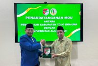 Bupati Touna, Ilham Lawidu Bersama Rektor Universitas Alkhairaat Palu, Moh.Yasin Saat Saat Melakukan Penandatanganan MoU