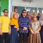 Bupati Ilham Lawidu Didampingi Wakil Bupati, Hj. Surya Saat Meresmikan ATM Bank Sulteng di Pasar Sentral Ampana Desa Sansarino. 
