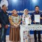 Bupati Touna, Ilham Lawidu Bersama Direktur Utama PT. Bank Sulteng Saat Menandatangani Perjanjian Kerjasama Terkait Pengggunaan SIPD RI Untuk Pencairan SP2D Online. 