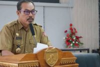 Pejabat Sekda Touna, Alfian Matajeng Saat Memberikan Sambutan di Kegiatan Penguatan Kapasitas Hak Asasi Manusia Bagi ASN di Touna