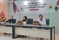 Wakil Bupati Touna, Hj. Surya Lapasiri Membuka Sosialisasi Waspada Aktivitas Keuangan Ilegal.