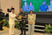 Bupati Touna, Ilham Lawidu Saat Menghadiri Pisah Sambut Danrem 132/Tadulako