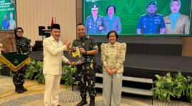 Bupati Touna, Ilham Lawidu Saat Menghadiri Pisah Sambut Danrem 132/Tadulako