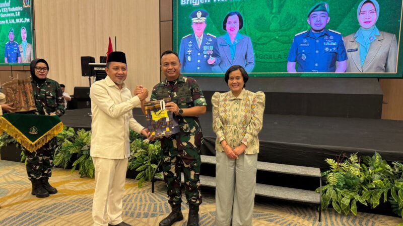 Bupati Touna, Ilham Lawidu Saat Menghadiri Pisah Sambut Danrem 132/Tadulako