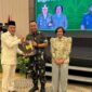 Bupati Touna, Ilham Lawidu Saat Menghadiri Pisah Sambut Danrem 132/Tadulako