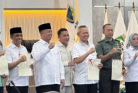 Bupati Touna, Ilham Lawidu Saat Menghadiri Rakor Bersama Menteri ATR/BPN di Palu.