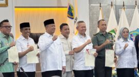 Bupati Touna, Ilham Lawidu Saat Menghadiri Rakor Bersama Menteri ATR/BPN di Palu.