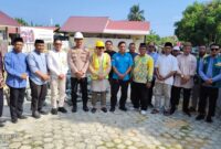 Bupati Touna, Ilham Lawidu Meletakan Batu Pertama Pembangunan Ruang Kelas Baru SD IT Al Wahdah.