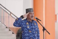 Sekda Touna, Alfian Matajeng Saat Memimpin Upacara Peringatan Harkitnas.