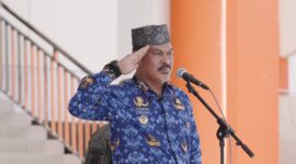Sekda Touna, Alfian Matajeng Saat Memimpin Upacara Peringatan Harkitnas.