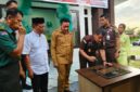 Bupati Touna, Ilham Lawidu Saat Menghadiri Peresmian Gedung PTSP Klinik dan Ruangan IAD di Kejaksaan.