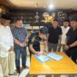 Bupati Touna, Ilham Lawidu Saat Melakukan Penandatanganan Berita Acara Serah Terima Lokasi Pekerjaan Pembangunan Kampung Nelayan Merah Putih.  