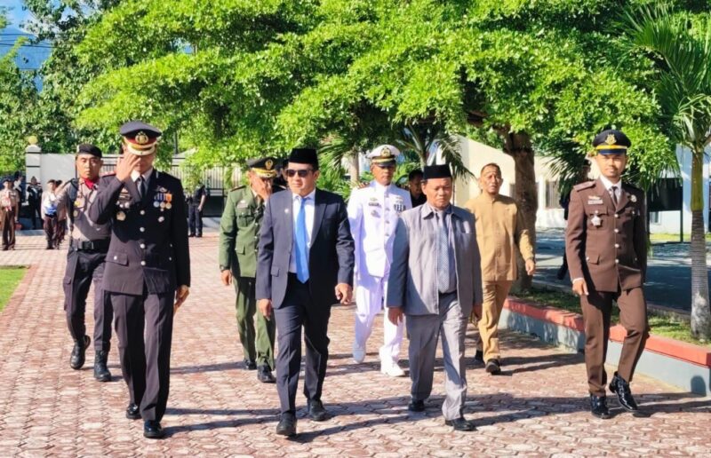 Bupati, Ilham Lawidu Hadiri Upacara dan Syukuran Hari Bhayangkara Ke-80 di Polres Touna.