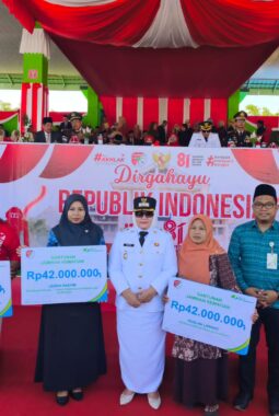 Wabup Touna Menyerahkan Santunan JKM BPJS Ketenagakerjaan Kepada 3 Ahli Waris