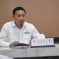 Bupati Touna, Ilham Lawidu Saat Mengikuti Reboan Secara Dering Bersama Kemendagri.