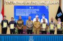 Bupati Ilham Lawidu saat menghadiri penandatanganan kesepakatan bersama antar daerah dan perjanjian kerjasama replika sistem integrasi geospasial informasi tanah dan pajak di Puspemkot Tangsel.